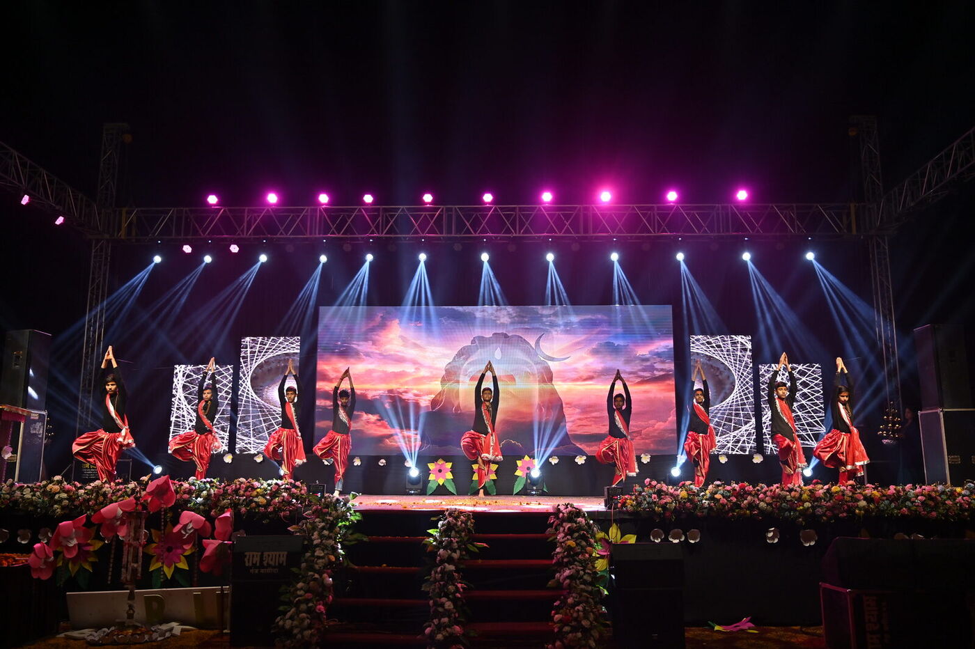 A full-stage performance under concert lighting at Sparkle 2025, the GNPS annual concert