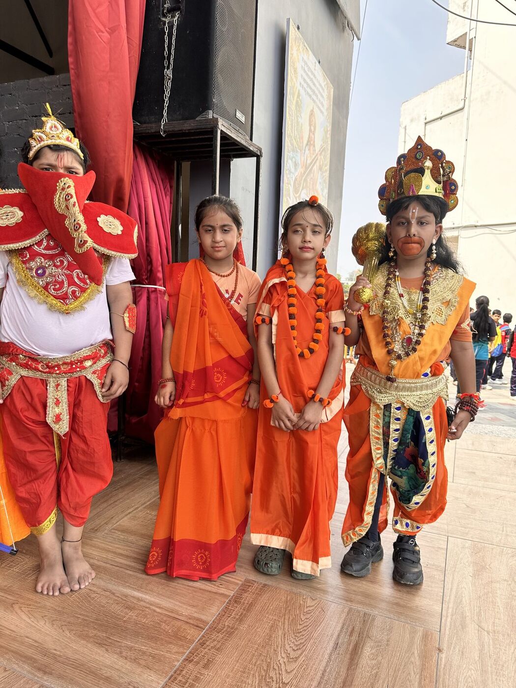 Students in Ram, Sita and Hanuman costumes at the Dussehra programme